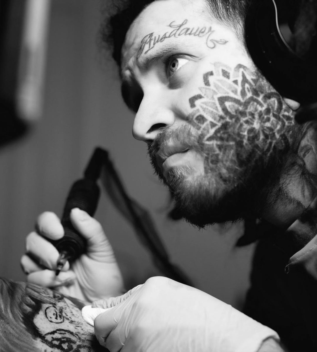 Tattoo artist using FYT tattoo supplies and cartridges in New York studio, close up