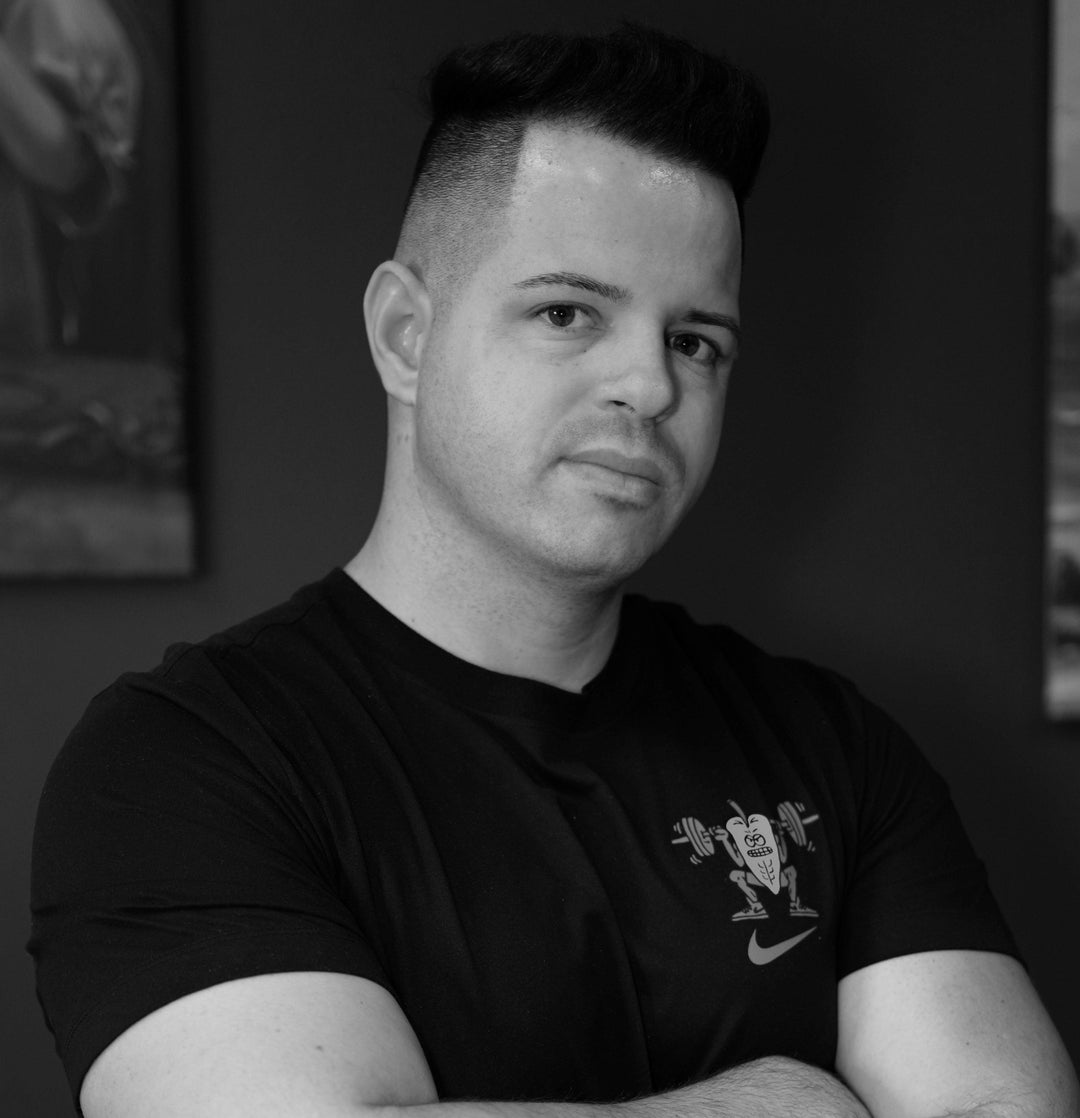 Tattoo artist in black shirt at FYT Tattoo Supplies New York studio